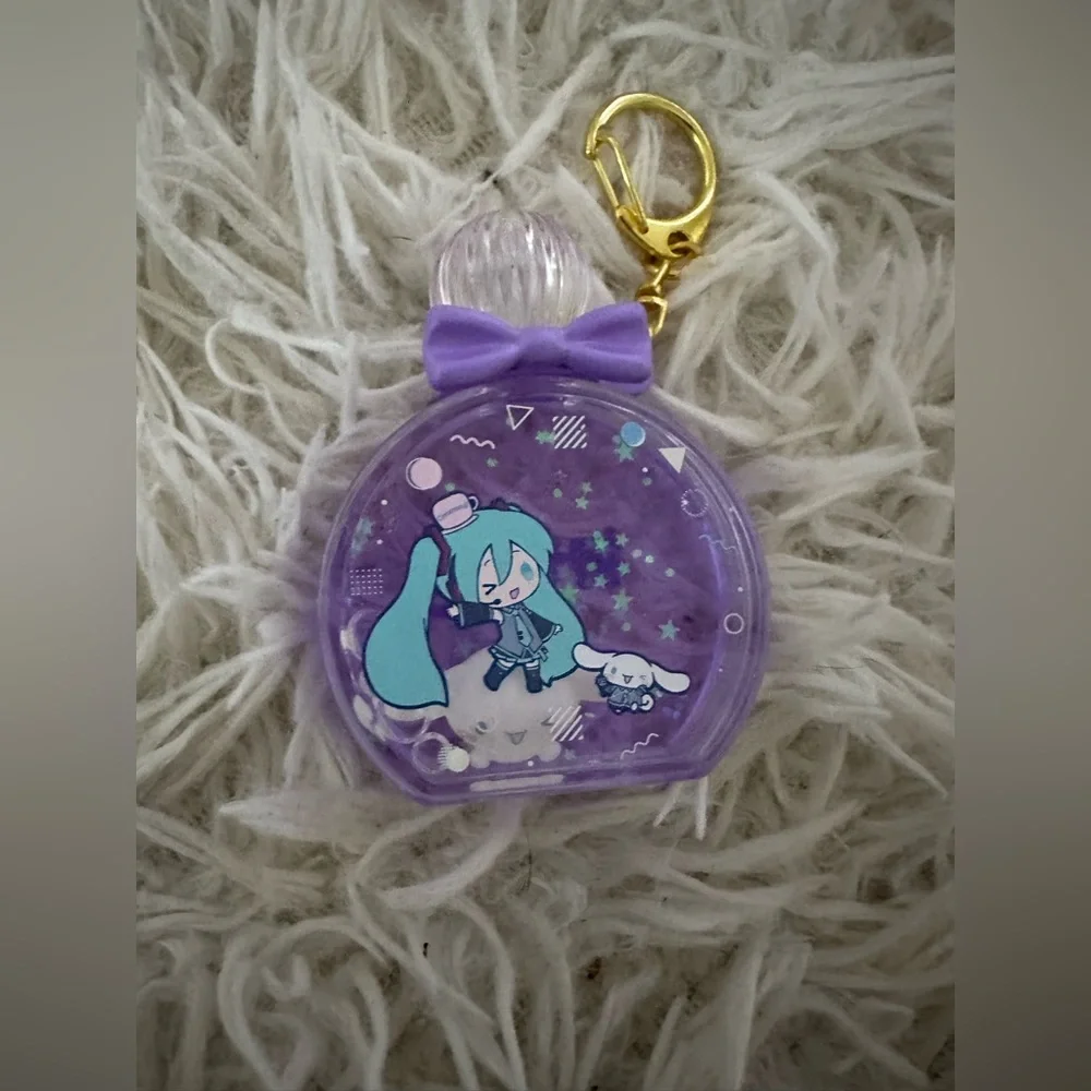 Cinnamon Roll Purple and Gold‎ Pet Charm